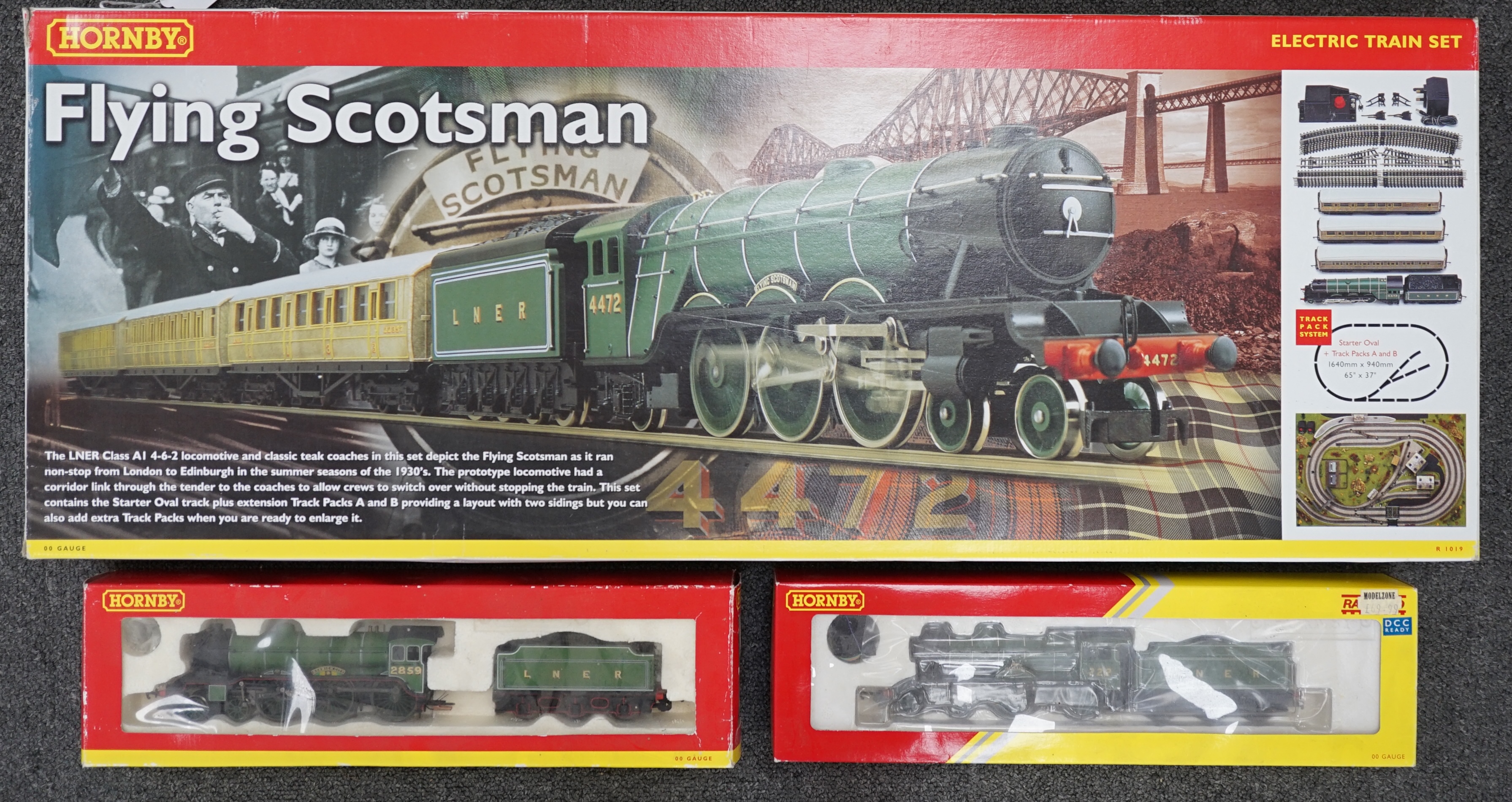 Nine Hornby 00 gauge LNER model railway items, including; a Flying Scotsman train set (R1019) comprising of Flying Scotsman and three teak coaches (missing some accessories and controllers), two additional tender locomot